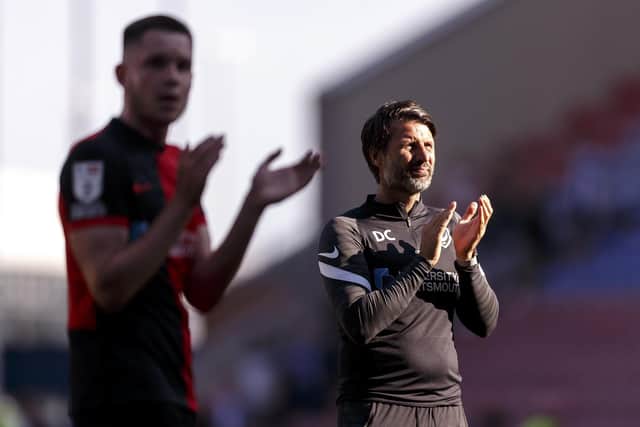 Pompey head coach Danny Cowley applauds the Blues fans after the 1-0 defeat at Wigan.  Picture: Daniel Chesterton/phcimages.com