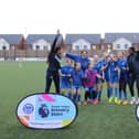 Solent Junior School winning football team joined by Portsmouth FC Women at the Premier League Primary Stars U11 Girls Tournament at Pompey in the Community's John Jenkins Stadium