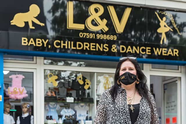 Lesley Gofton in front of her shop in Leigh Park. Picture: Mike Cooter (240621)