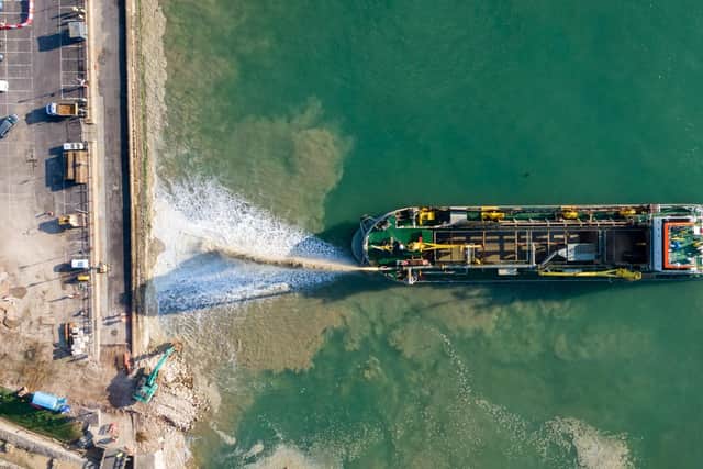 Aerial view of the Rainbow Dredging at work on November 05, 2020 in Portsmouth, England. Dredging vessel, the Sospan Dau, is working to create a temporary working platform to enable works as part of the Southsea Coastal Scheme, which will install new sea defenses. (Photo by Finnbarr Webster/Getty Images)