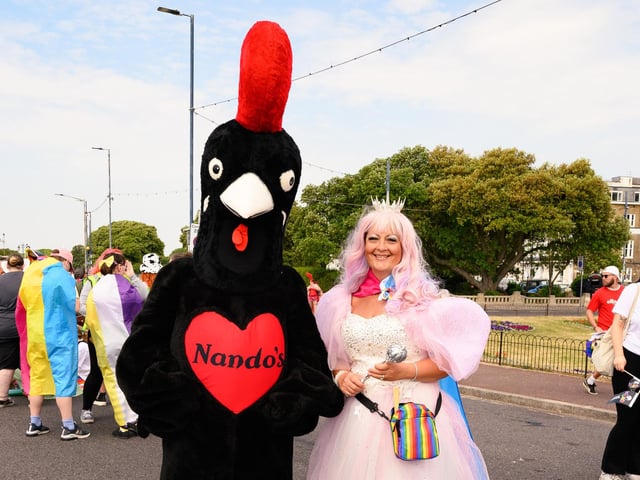 A Nando's mascot in the parade.
Picture: Keith Woodland