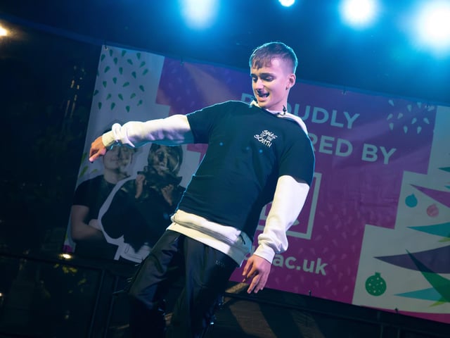 Hundreds of residents descended on Commercial Road to watch local dance troops and celebrities come together to turn on the Christmas lights.Pictured - Young dancers performing on stagePhotos by Alex Shute