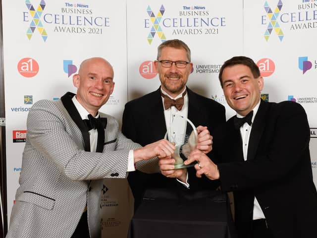 The News Business Excellence Awards 2021. Pictured is: Craig Gordon and Michael Frisbee of Vuzion UK. with Mark Waldron. Picture: Keith Woodland (080721-63)