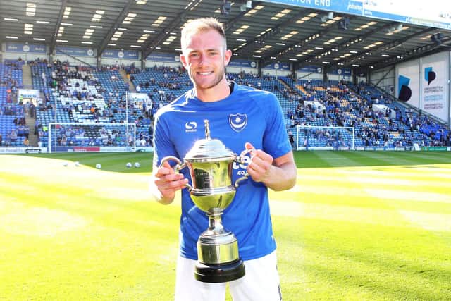 Matt Clarke with The News/Sports Mail's Pompey Player of the Season Trophy for 2017-18. Picture: Joe Pepler