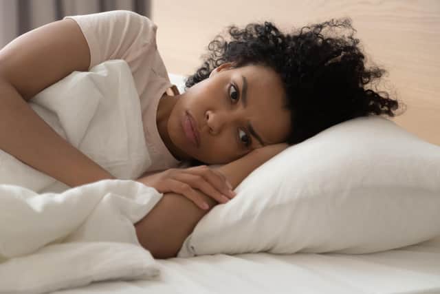 A generic stock photo of a woman in bed thinking. See PA Feature ADVICE Ask Fiona. Picture credit should read: Alamy/PA. WARNING: This picture must only be used to accompany PA Feature ADVICE Ask Fiona.