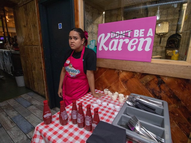 She doesn't look very happy, but that's the point.