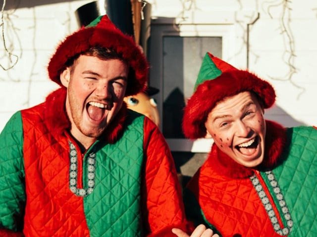 Two elves in the Christmas Village at Seal Bay in Selsey
