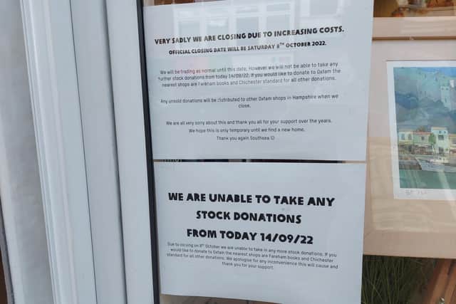 The signs in the window of the Oxfam shop in Osborne Road, Southsea, announcing that it will close on October 8, 2022