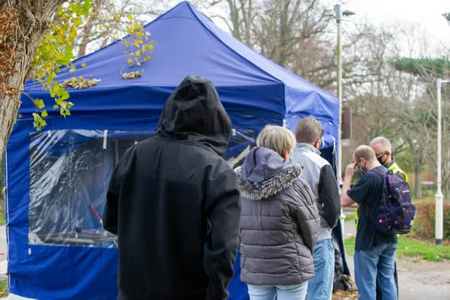 People queuing outside the Solent Covid Vaccination Centre at Hamble House, St James Hospital. Picture: Habibur Rahman