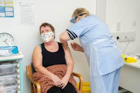 Dr Wendy Peters giving Jackie Blake a vaccination jab at St James Hospital, Portsmouth on 17 February 2021. Picture: Habibur Rahman