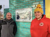 Councillor Steve Pitt and Sarah Shreeve with a stormwater release sign. Picture: Portsmouth City Council.