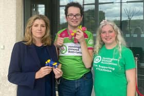 Penny Mordaunt, with her Sybil felt dog, met with Harley Salter and his mum Vanessa