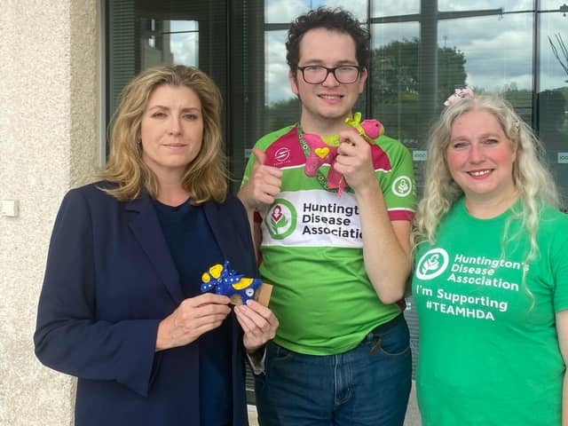 Penny Mordaunt, with her Sybil felt dog, met with Harley Salter and his mum Vanessa