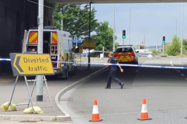 A car has crashed through a barrier on the M275 northbound and landed on the roundabout below near the city council's park and ride facility in Tipner on July 15 2020. Picture: Habibur Rahman