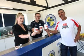 Chris Kamara pictured unveiling new facilities at Hawks Community Youth FC as part of Howdens Kitchens & England Football activity, Southwick. Pictured is (L-R) Lindsay Hellier, Howdens Portsmouth Depot Manager, Daryn Brewer, Chairman of Grassroots at Hawks Community Youth FC, and Chris Kamara. Picture: Sam Stephenson.