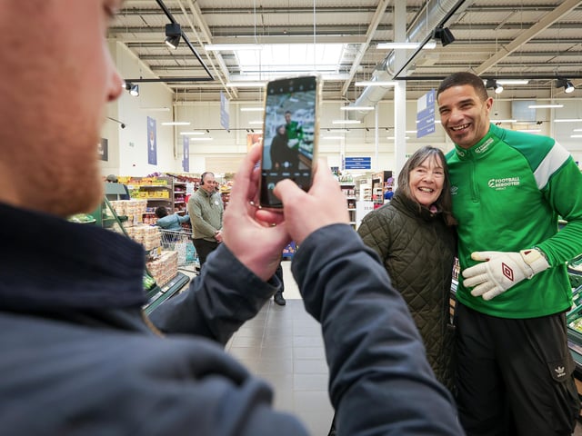 Linda Samways gets a picture with David James. Ms Samways told the photographer her son was goalkeeper for the academies at Portsmouth and Southampton. Former England and Portmouth goalkeeper, David James launched Football Rebooted at Tesco, Fratton Way, Portsmouth. Utilita an Pompey in The Community have brought Football Rebooted to the city. It's a boot collection box where football boots (for instance a pair of boots that a child has grown out of but still with loads of life in them) can be donated and redistributed to another player Picture: Chris  Moorhouse (180125-09)