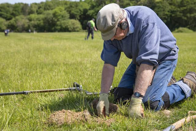 The team search the site for any hidden treasures