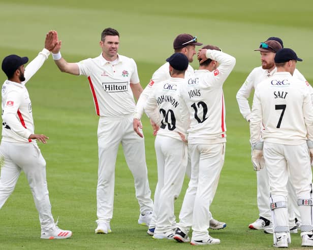 James Anderson, second left, is congratulated after dismissing Hampshire skipper James Vince during day two of the LV= Insurance County Championship match at The Ageas Bowl. Photo by Warren Little/Getty Images.