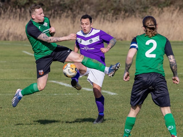 AFC Hilsea (purple) v Saturn Royale. Picture: Mike Cooter