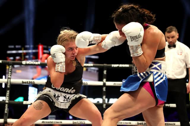 Ebonie Jones lands a left hand in her super-bantamweight contest draw with Effy Kathopouli in Glasgow Picture: Steve Welsh/PA Wire
