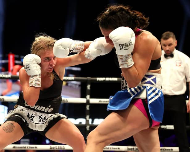 Ebonie Jones lands a left hand in her super-bantamweight contest draw with Effy Kathopouli in Glasgow Picture: Steve Welsh/PA Wire