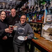 Square Cow, Wickham Square, Wickham, has adapted by turning into a coffee house as well as a pub, due to the cost of living crisis. Pictured: Owner Frank Dixie with assistant manager,Natasha Lipscombe and Kerry Neale, head chef at Square Cow Wickham Square on Wednesday 14th December 2022. Picture: Habibur Rahman
