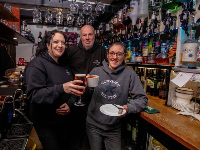 Square Cow, Wickham Square, Wickham, has adapted by turning into a coffee house as well as a pub, due to the cost of living crisis. Pictured: Owner Frank Dixie with assistant manager,Natasha Lipscombe and Kerry Neale, head chef at Square Cow Wickham Square on Wednesday 14th December 2022. Picture: Habibur Rahman