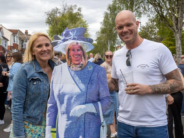 Residents of  Aberdare Avenue, Drayton, with a cut out of friend Helen who couldn't make it to the party.   Photos by Alex Shute