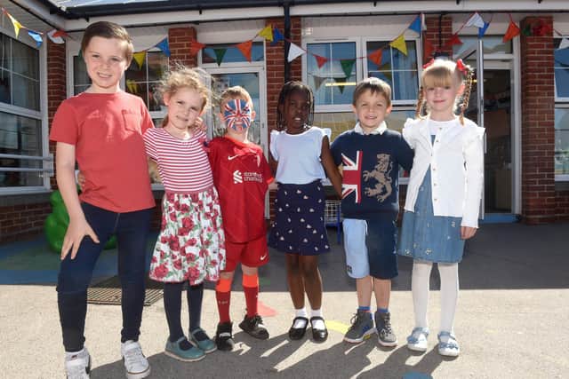 Pupils from Meon Infant, Meon Juniors and Moorings Way Infant School in Southsea, celebrated The Queen's Platinum Jubilee at each school on Friday, May 27.

Pictured is: Moorings Way Infant School pupils (l-r) Max Dungworth (7), Maia Spencer-Haynes (5), Jake Shelton (6), Ayla Warsop (7), Thomas Reynolds (4) and Addison Pitcher (6).

Picture: Sarah Standing (270522-8339)