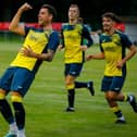 Callum Laycock celebrates scoring Moneyfields' opening goal of the 2023/24 season at Hythe last night. Picture by Dave Bodymore.