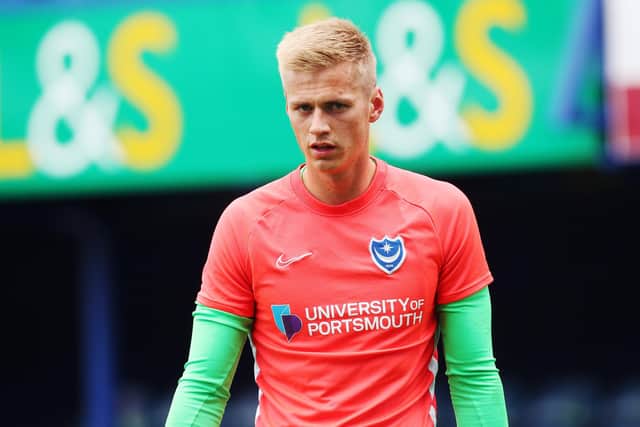 Alex Bass is currently sidelined with a calf injury, with Pompey exploring other options, including Huddersfield's Jacob Chapman. Picture: Joe Pepler