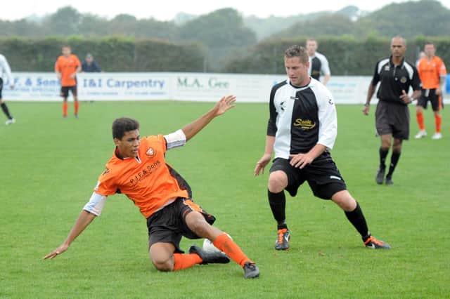 Andy Rinomhota in action for AFC Portchester against Bemerton Heath in September 2014. Picture: Paul Jacobs