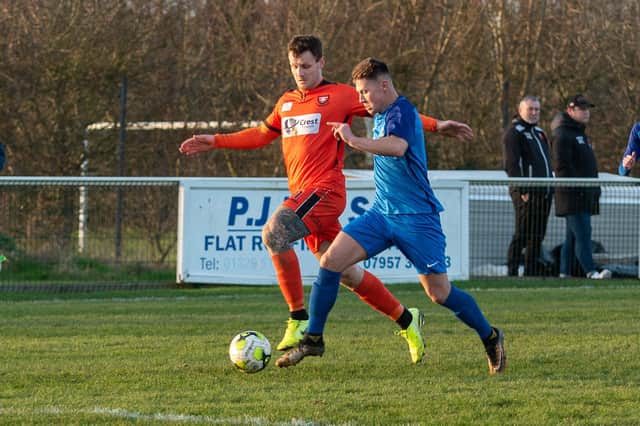 Tommy Scutt, right, in action for Baffins Milton against Portchester earlier this year. Picture: Vernon Nash