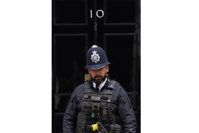 A police officer outside No 10.
