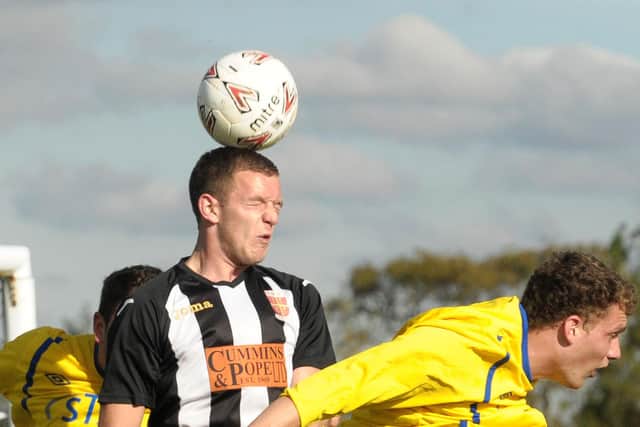 Balancing act - new AFC Portchester signing Luke Dempsey in action for Hayling United in their Wessex League days in 2012. Pic Mick Young