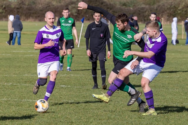AFC Hilsea (purple) v Saturn Royale. Picture: Mike Cooter