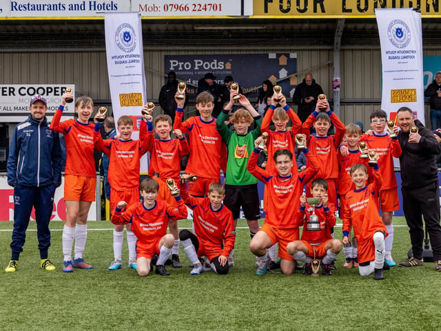 Denmead Youth Lions celebrate winning the Under-13 Truman Challenge Cup. Picture: Mike Cooter