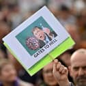 A protester holds up an anti-Bill Gates placard in Trafalgar Square in London on September 26, 2020, at a 'We Do Not Consent!' mass rally against vaccination and government restriction. Photo by Justin Tallis/AFP via Getty Images.