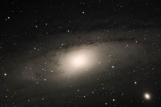 he Andromeda Galaxy (Messier 31), 2537 million light years from Earth,