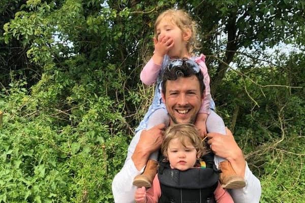 Daniel Brown, with his daughters, Molly, one and Chloe, three.