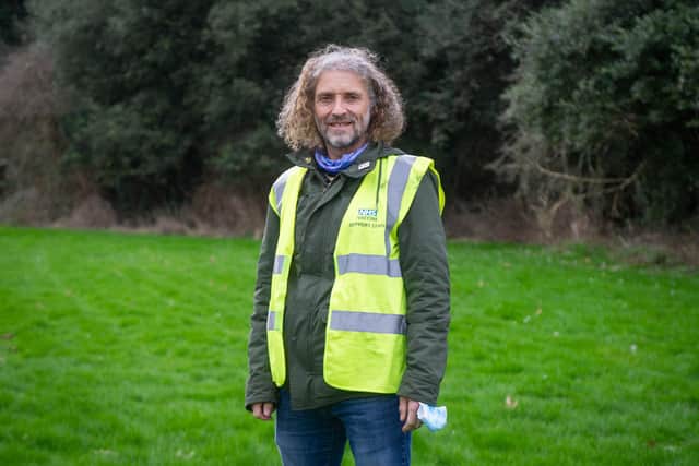 1 year anniversary of vaccines at St James Hospital, Portsmouth on Tuesday 1 February 2022
Pictured: Volunteer Brett Rumfitt at St James Hospital vaccine centre.
Picture: Habibur Rahman