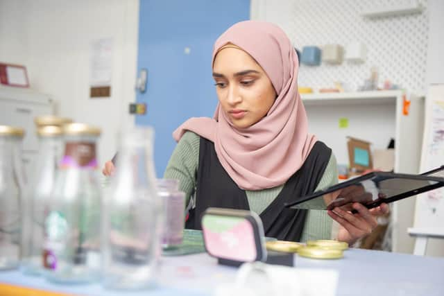 Ameenah Begum formulating product at her Portsmouth studio.

Picture: Habibur Rahman