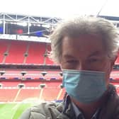 Simon Carter wearing his face mask at a near deserted Wembley.