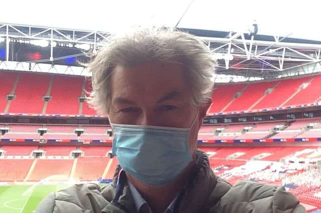 Simon Carter wearing his face mask at a near deserted Wembley.