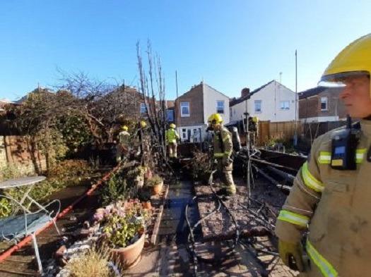 The fire spread across several properties.