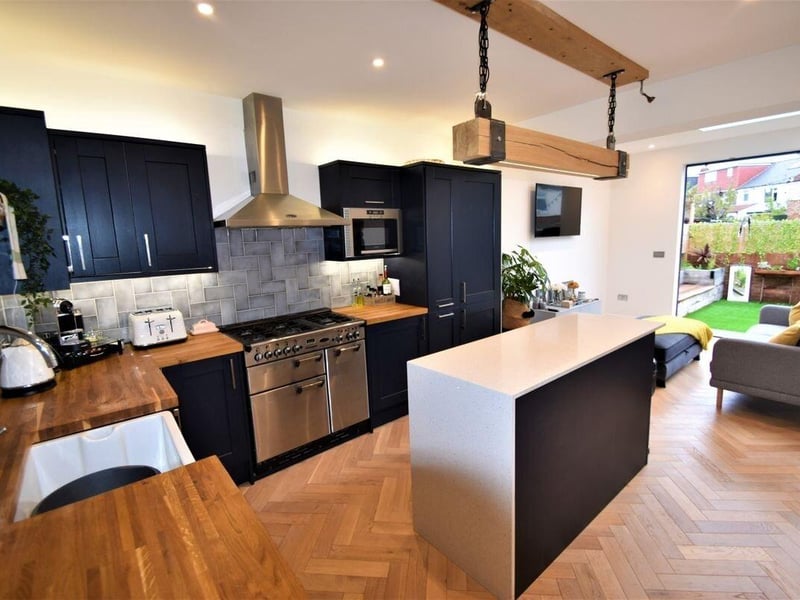 This property in Portsmouth comes with three bedrooms, two bathrooms and a reception room which is part of an open plan.