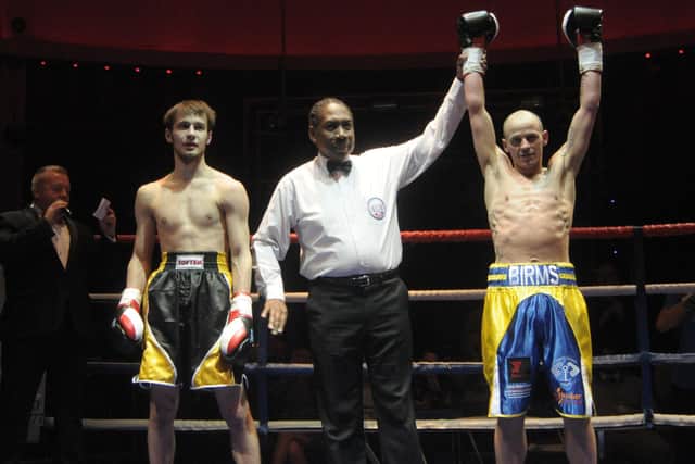 Dave Birmingham, right, celebrates his professional boxing debut victory over Antonis Zacests at Liquid &  Envy in March 2016.