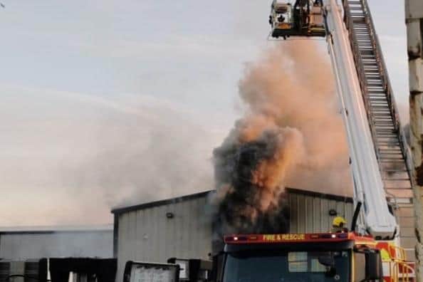 Aerial ladder platforms have been called to help firefighters tackle the blaze. Picture: Stuart Vaizey