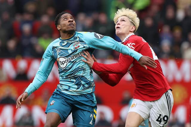 Southampton's Kyle-Walker-Peters battles for the ball with Manchester United substitute Alejandro Garnacho during Sunday's Premier League game at Old Trafford Picture: Matthew Peters/Manchester United via Getty Images