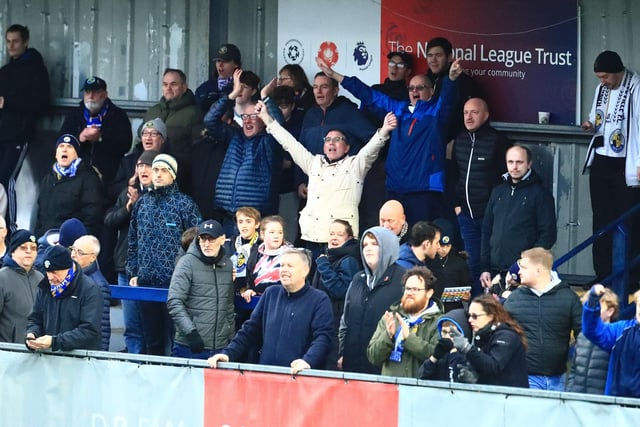 Hawks fans celebrate their side's late winner. Picture by Dave Haines